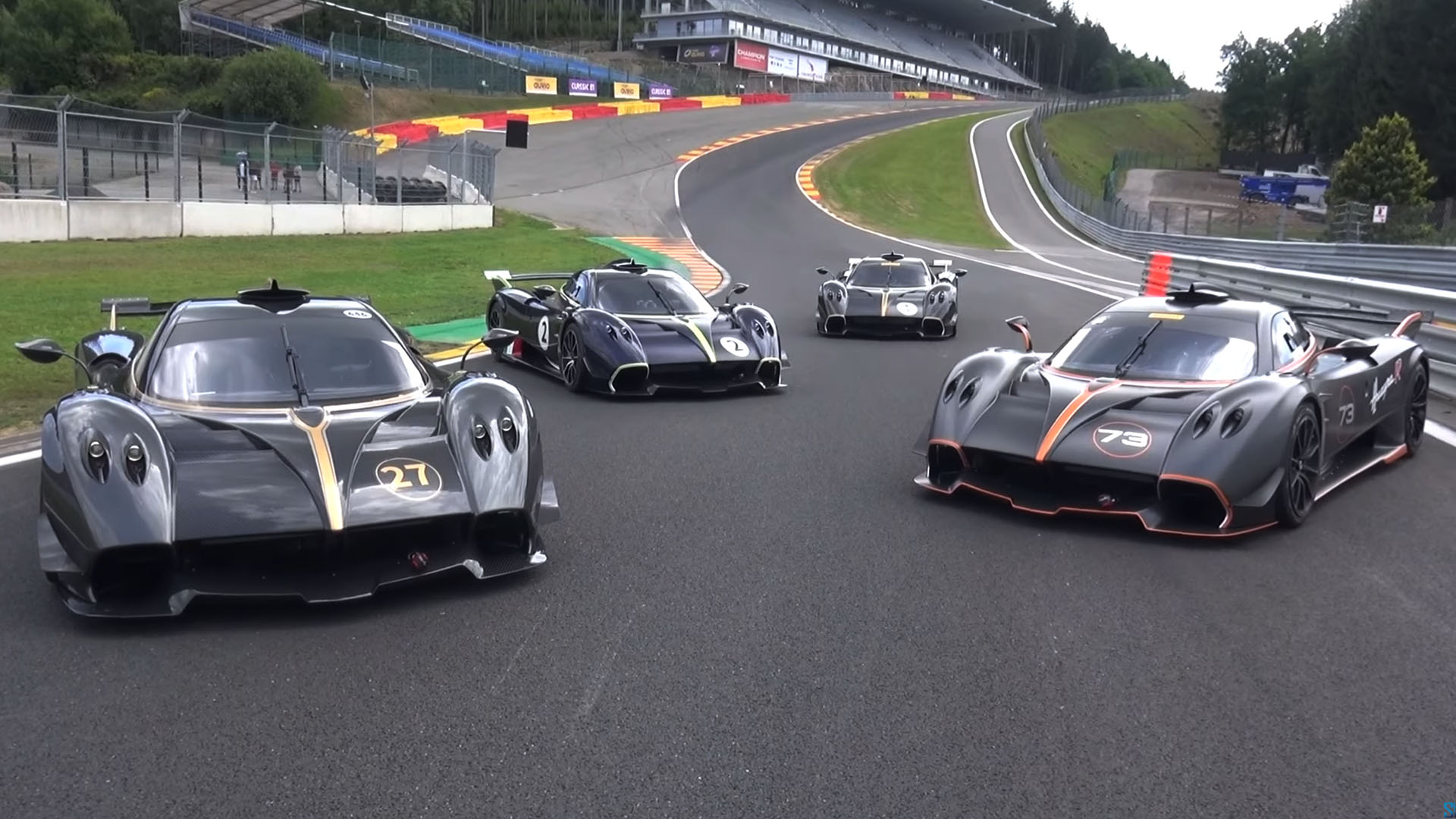 Image showing four Pagani Huayra R hypercars parked  on a race track