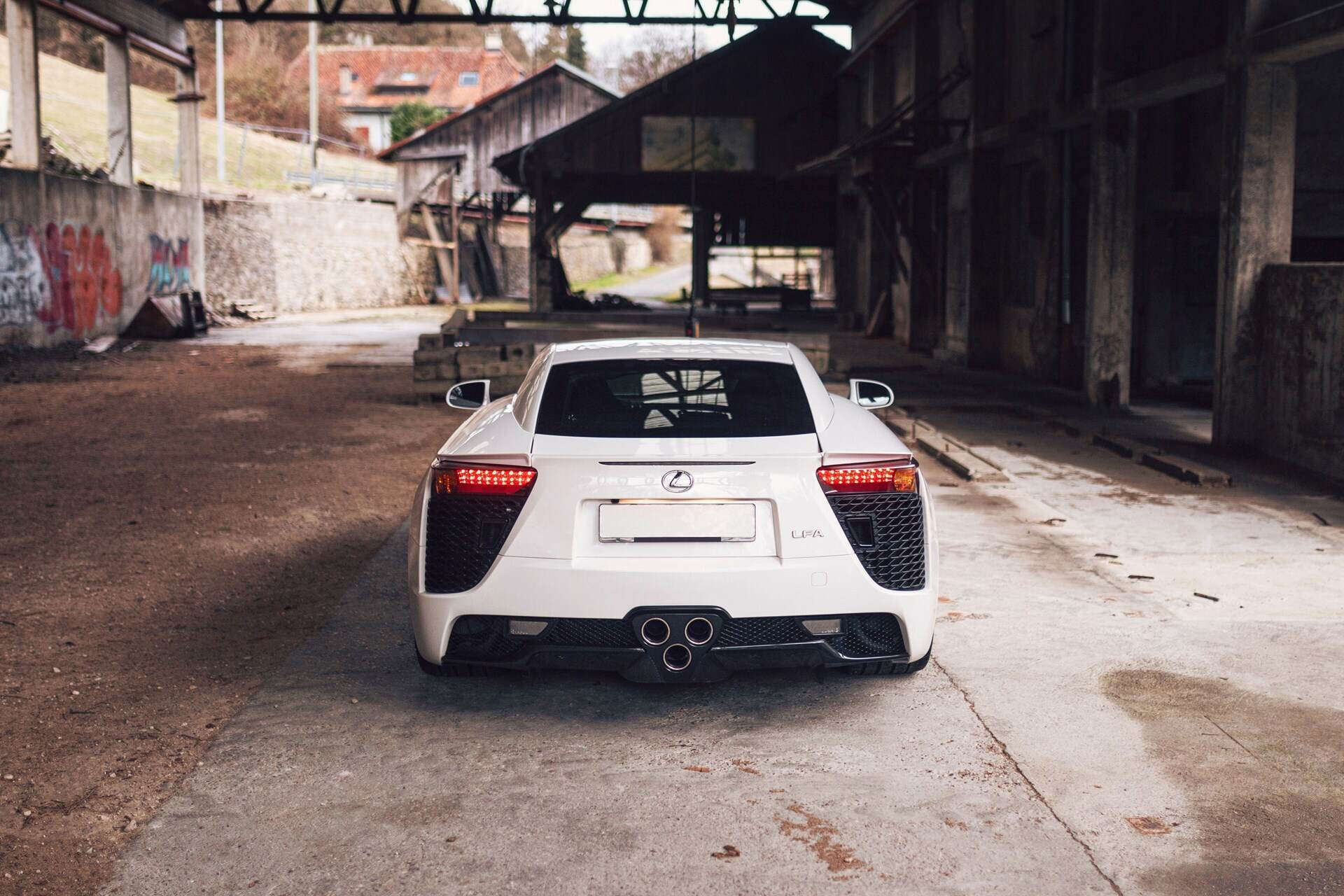 rear profile of a white 2011 Lexus LFA