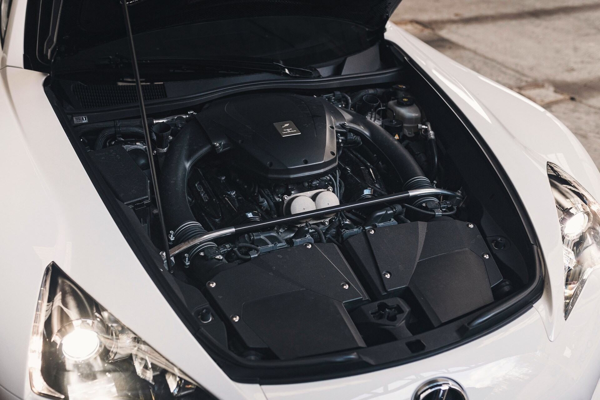 Engine bay of a white 2011 Lexus LFA