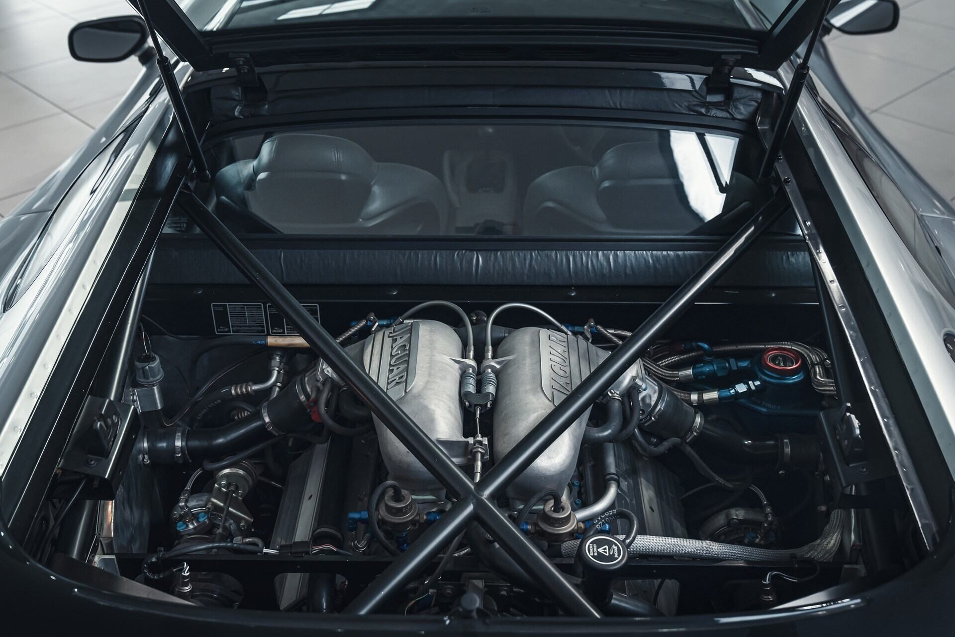 engine bay of a silver 1993 Jaguar XJ220