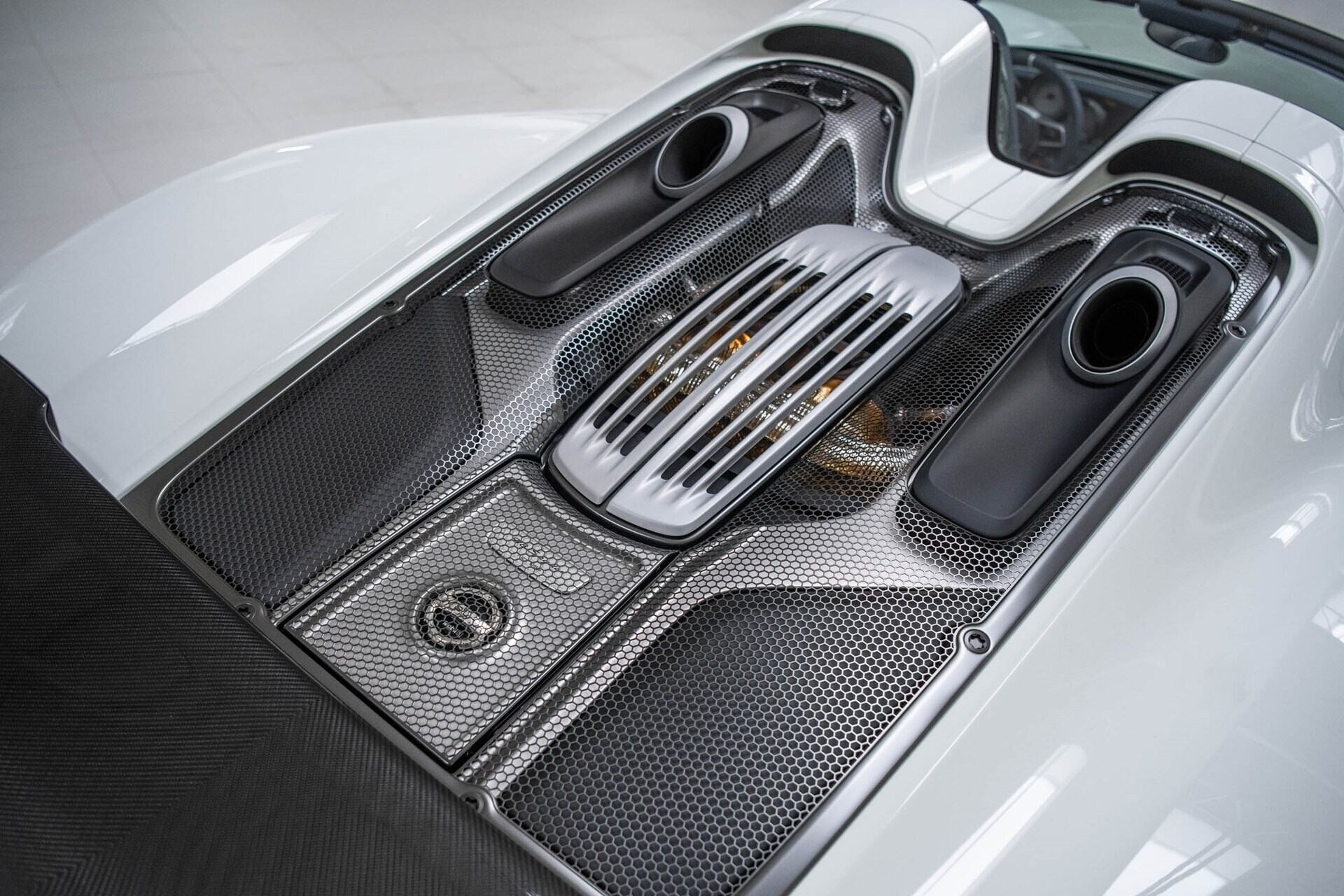 Image showing the top-mounted exhaust of a white 2015 Porsche 918 Spyder