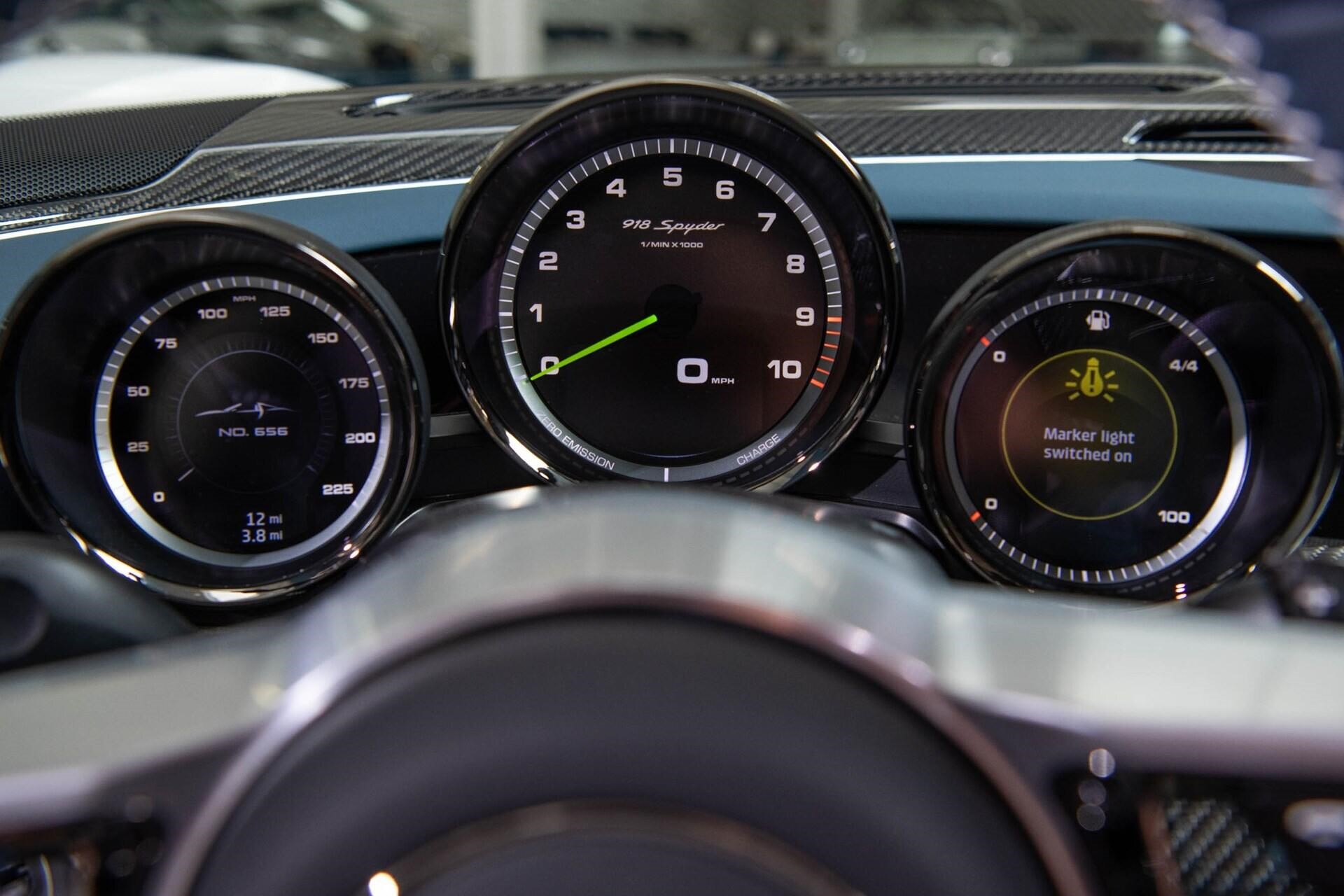 Dashboard view of a white 2015 Porsche 918 Spyder