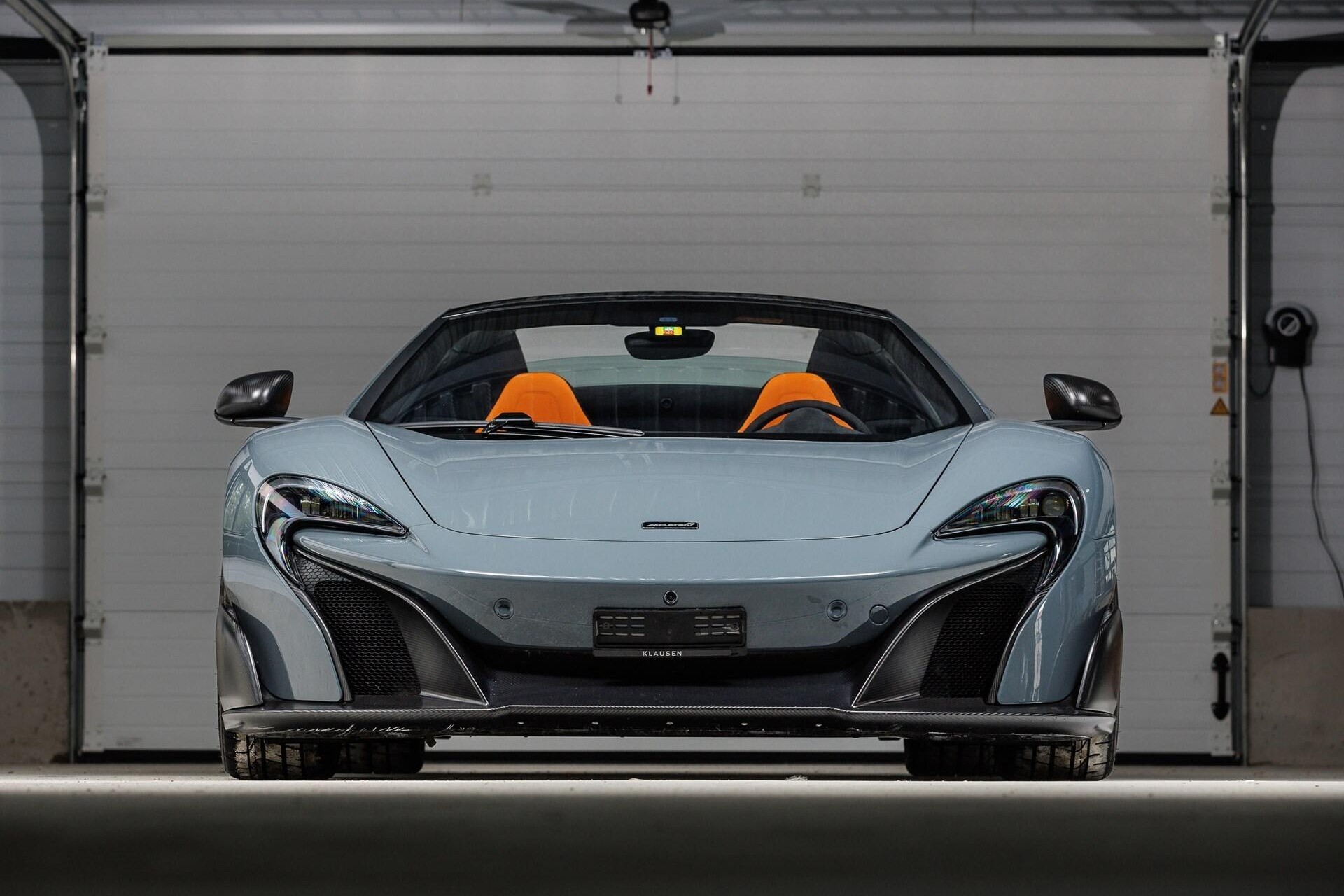 Frontal view of a 2017 Chicane Grey McLaren 675LT