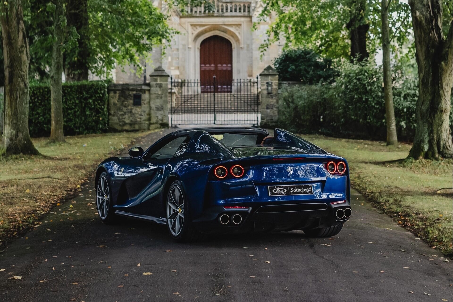 rear-angled view of a blue 2020 Ferrari 812 GTS