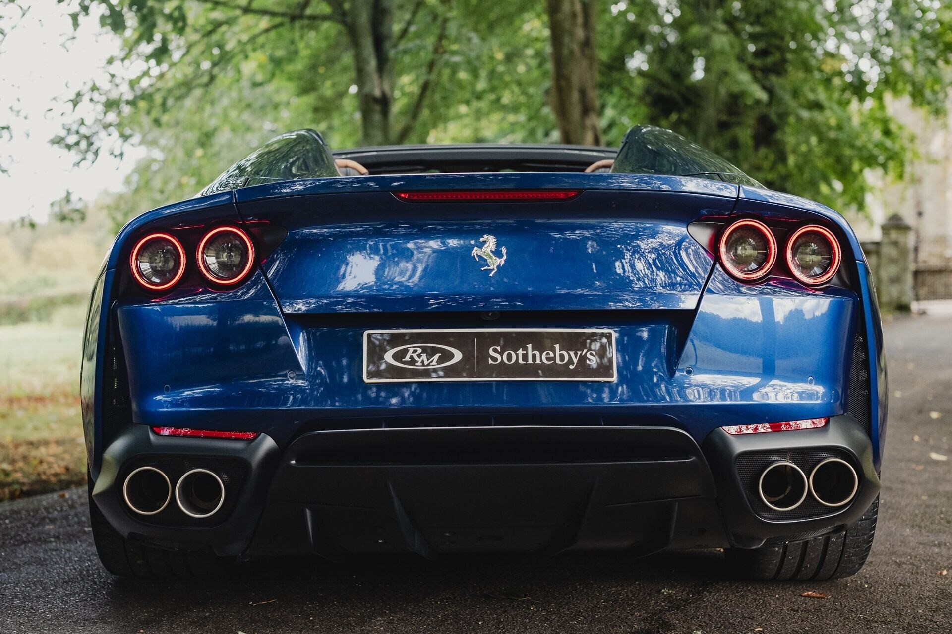 rear profile of a blue 2020 Ferrari 812 GTS