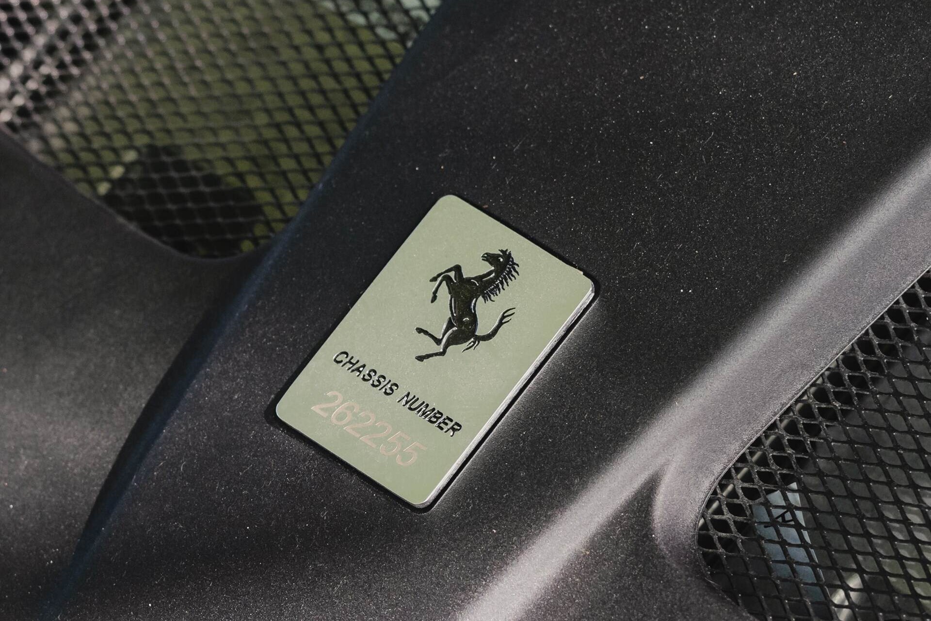 plaque showing the chassis number of a blue 2020 Ferrari 812 GTS