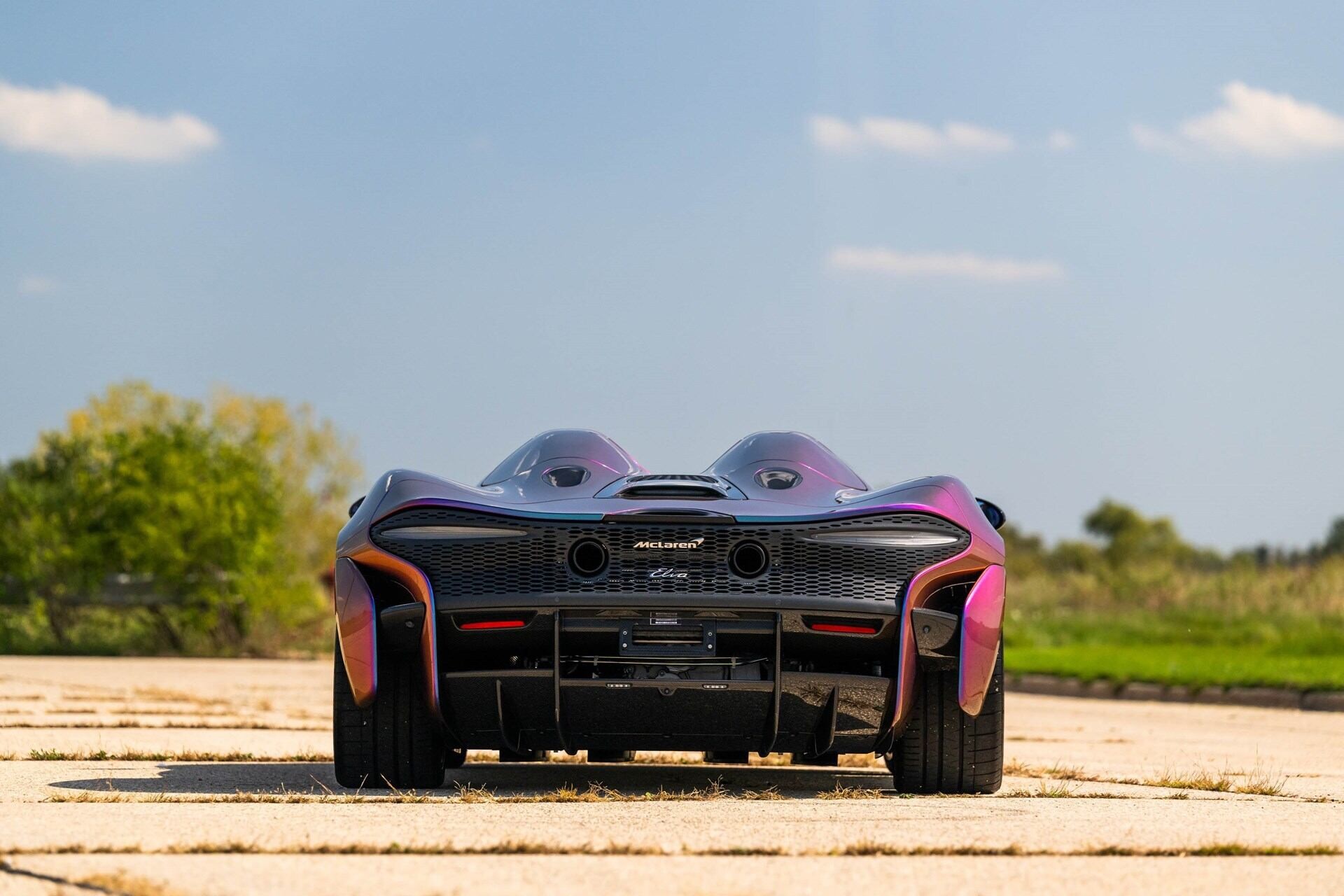 Rear profile of a purple 2021 McLaren Elva