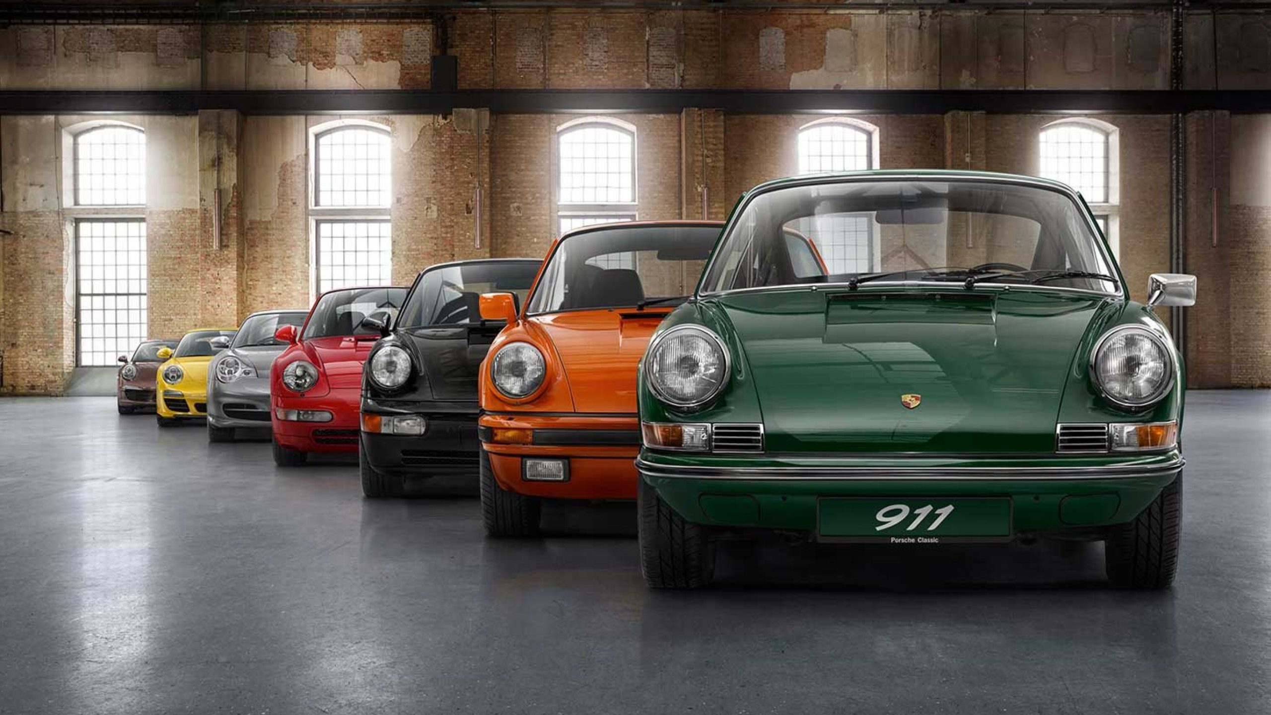 Image montrant sept générations de la Porsche 911