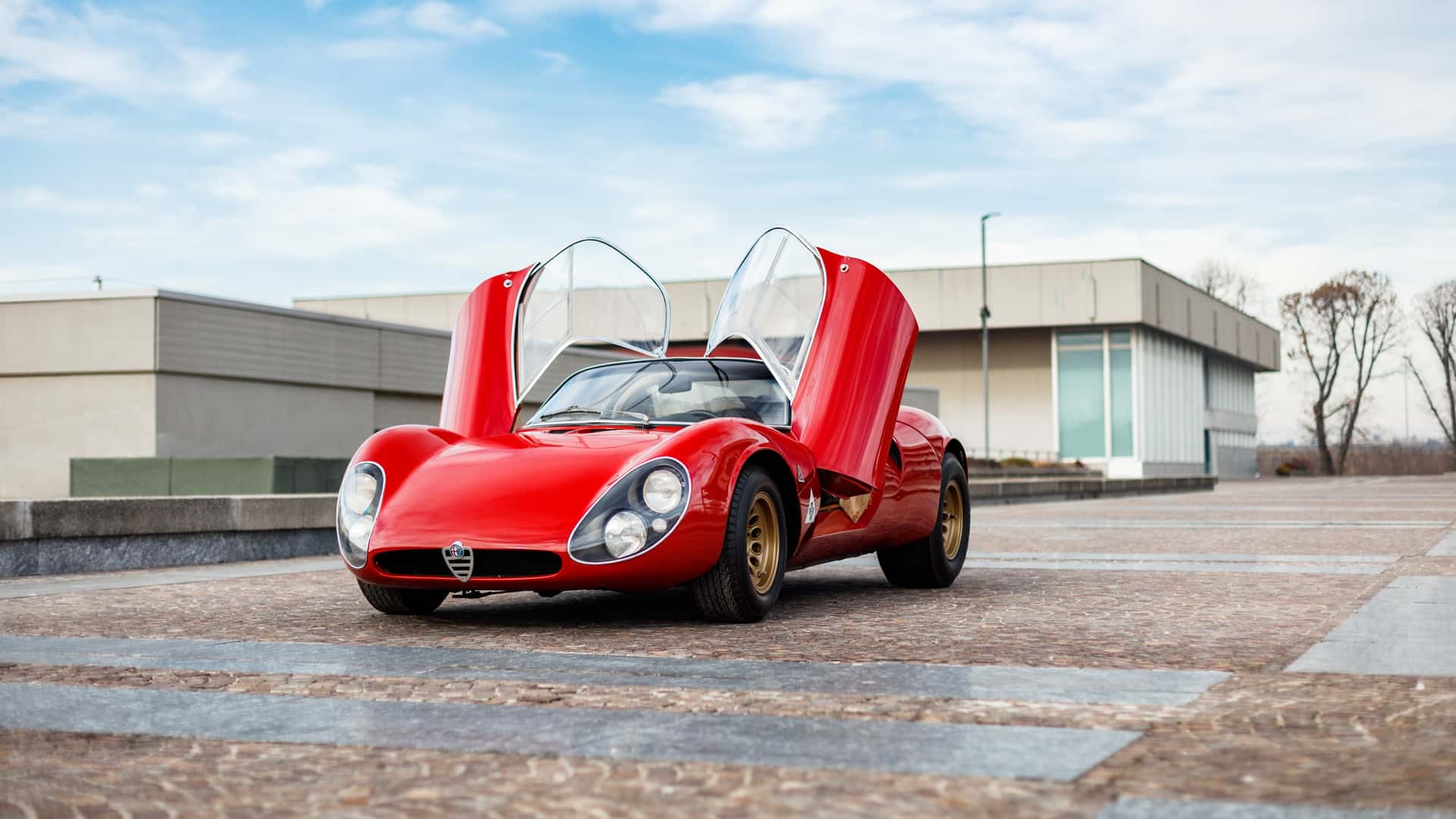 Three-quarter view of a 1967 Alfa Romeo Tipo 33 Stradale with butterfly wings open