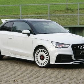 Three-quarter front view of a white Audi 8X A1 Quattro