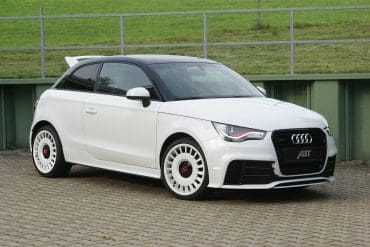 Three-quarter front view of a white Audi 8X A1 Quattro
