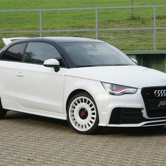 Three-quarter front view of a white Audi 8X A1 Quattro