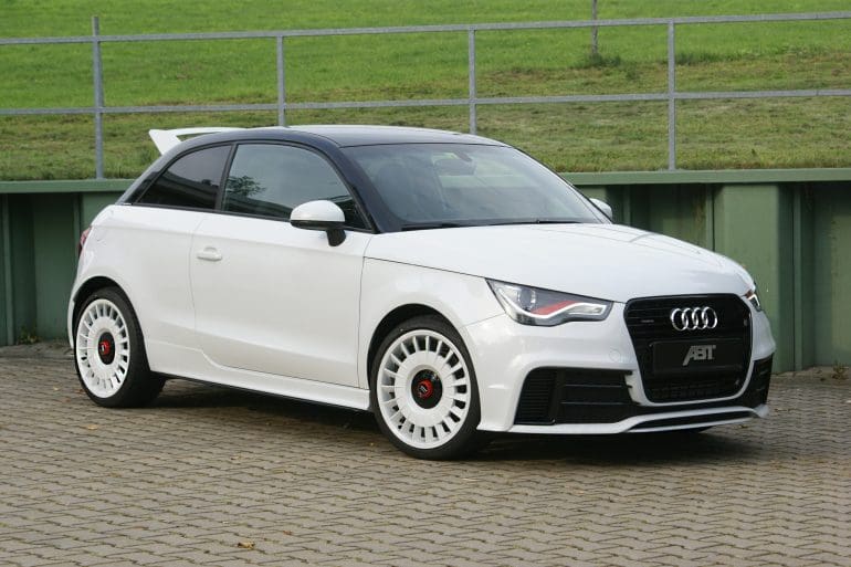 Three-quarter front view of a white Audi 8X A1 Quattro