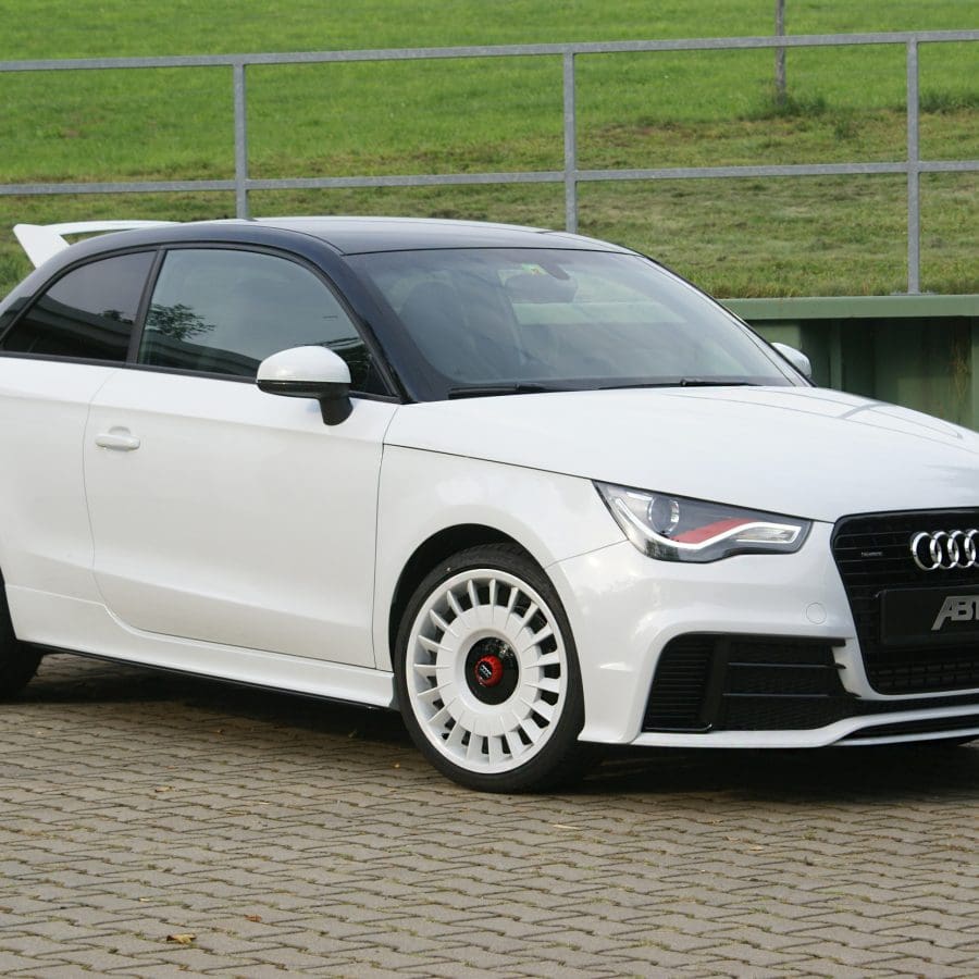 Three-quarter front view of a white Audi 8X A1 Quattro