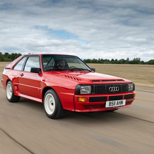 Three-quarter front view of a 1984 red Audi Sport Quattro