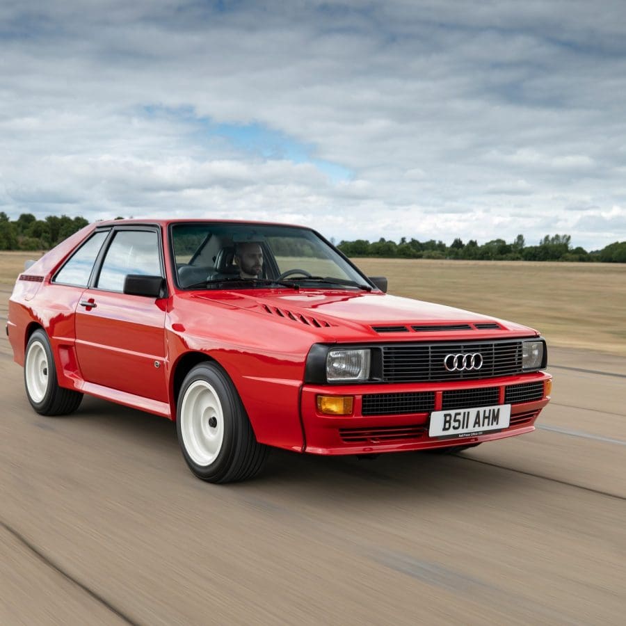 Three-quarter front view of a 1984 red Audi Sport Quattro