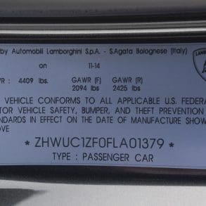 VIN plate on a 2015 Lamborghini Huracan door jamb showing vehicle identification number and manufacturing details