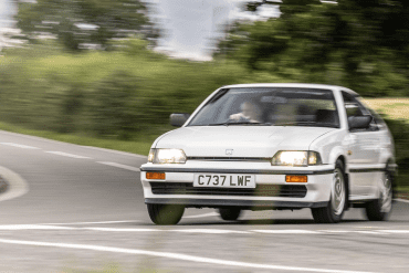 White 1985 Honda CR-X on a country road