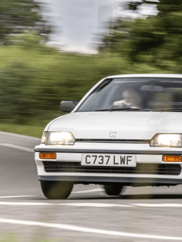 White 1985 Honda CR-X on a country road