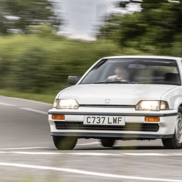 White 1985 Honda CR-X on a country road